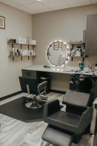 Modern salon room run by cosmetologists, featuring Natural Nail Care at The Nail Department and More.